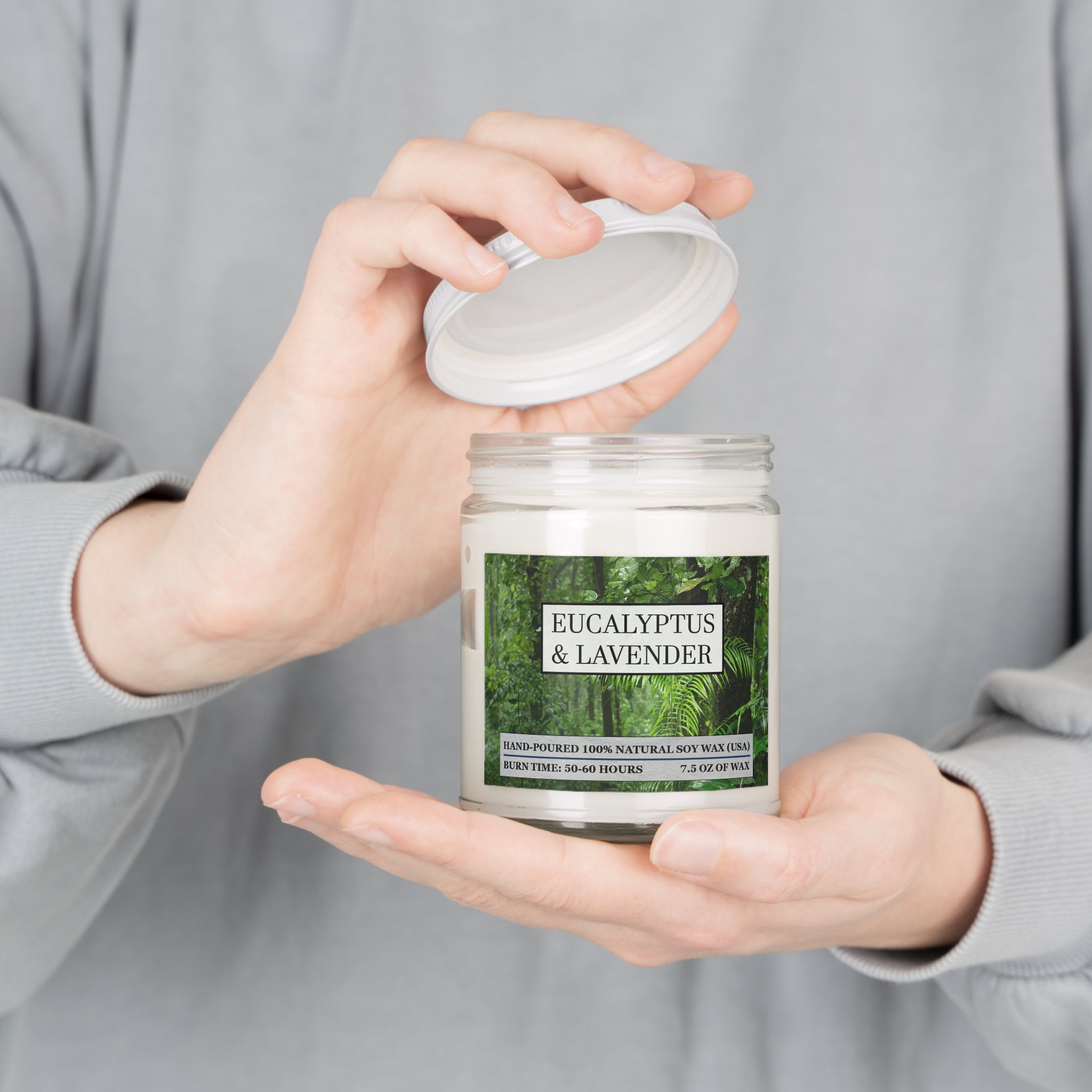 Eucalyptus and lavender scented natural soy wax candle with picture of a rainforest