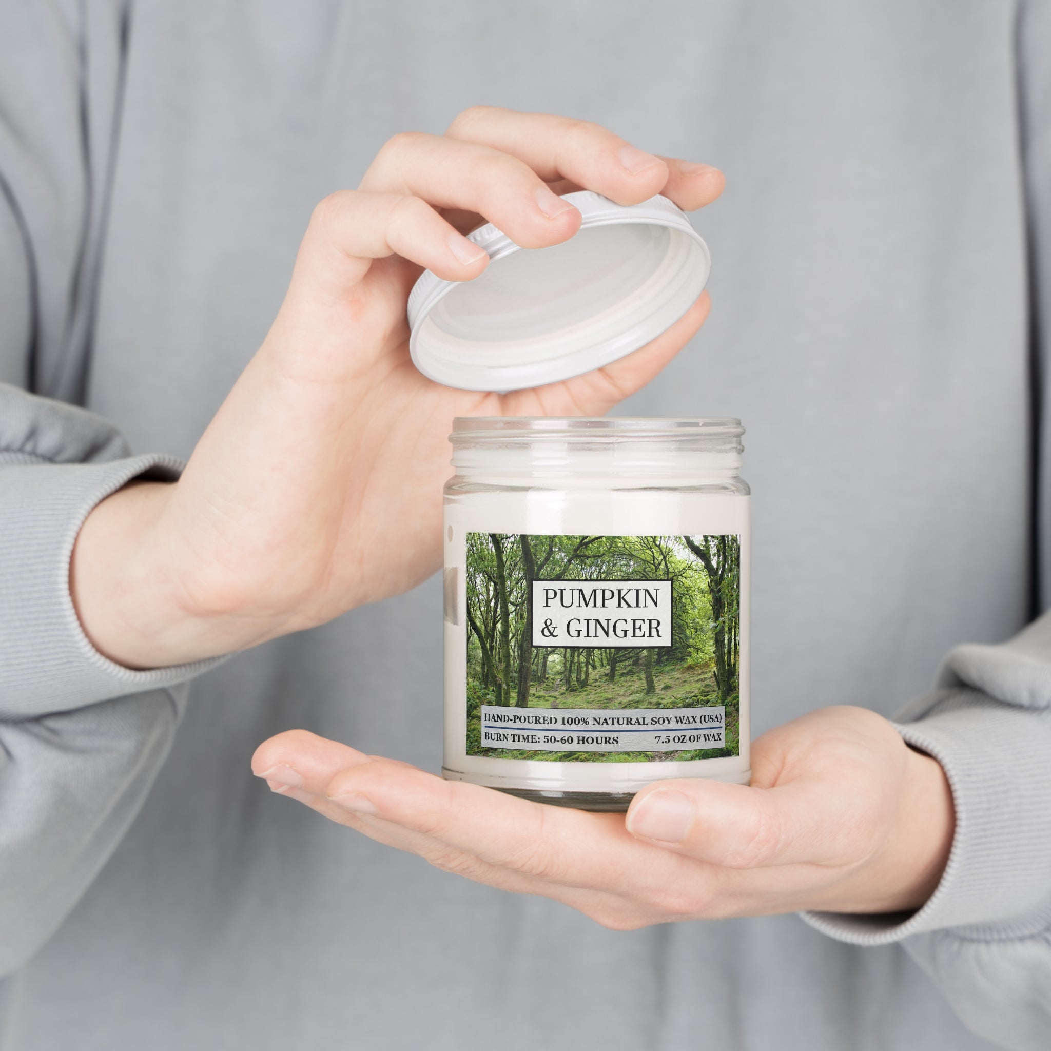 Pumpkin and ginger scented natural soy wax candle with the picture of a forest