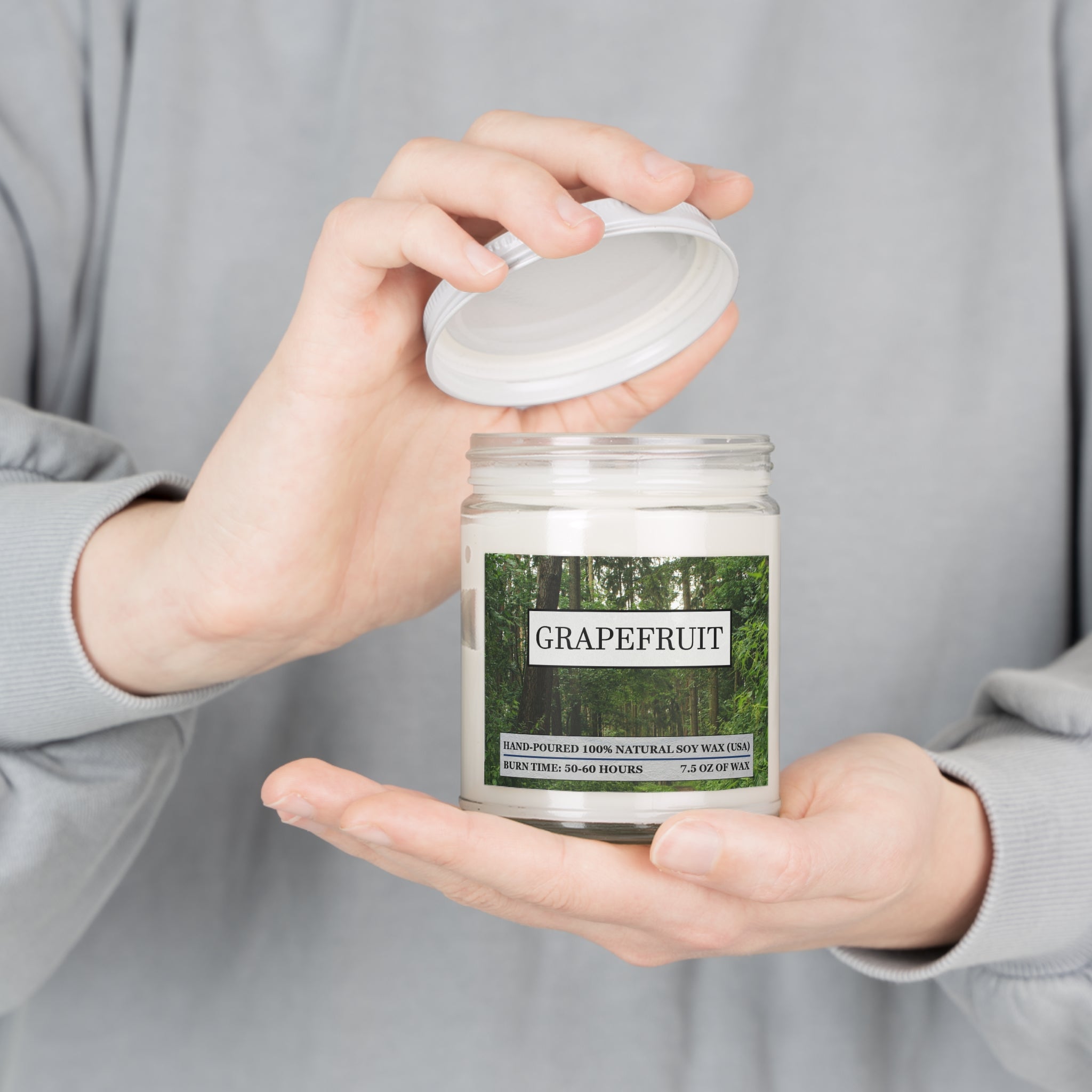Grapefruit scented natural soy wax candle with the picture of a forest